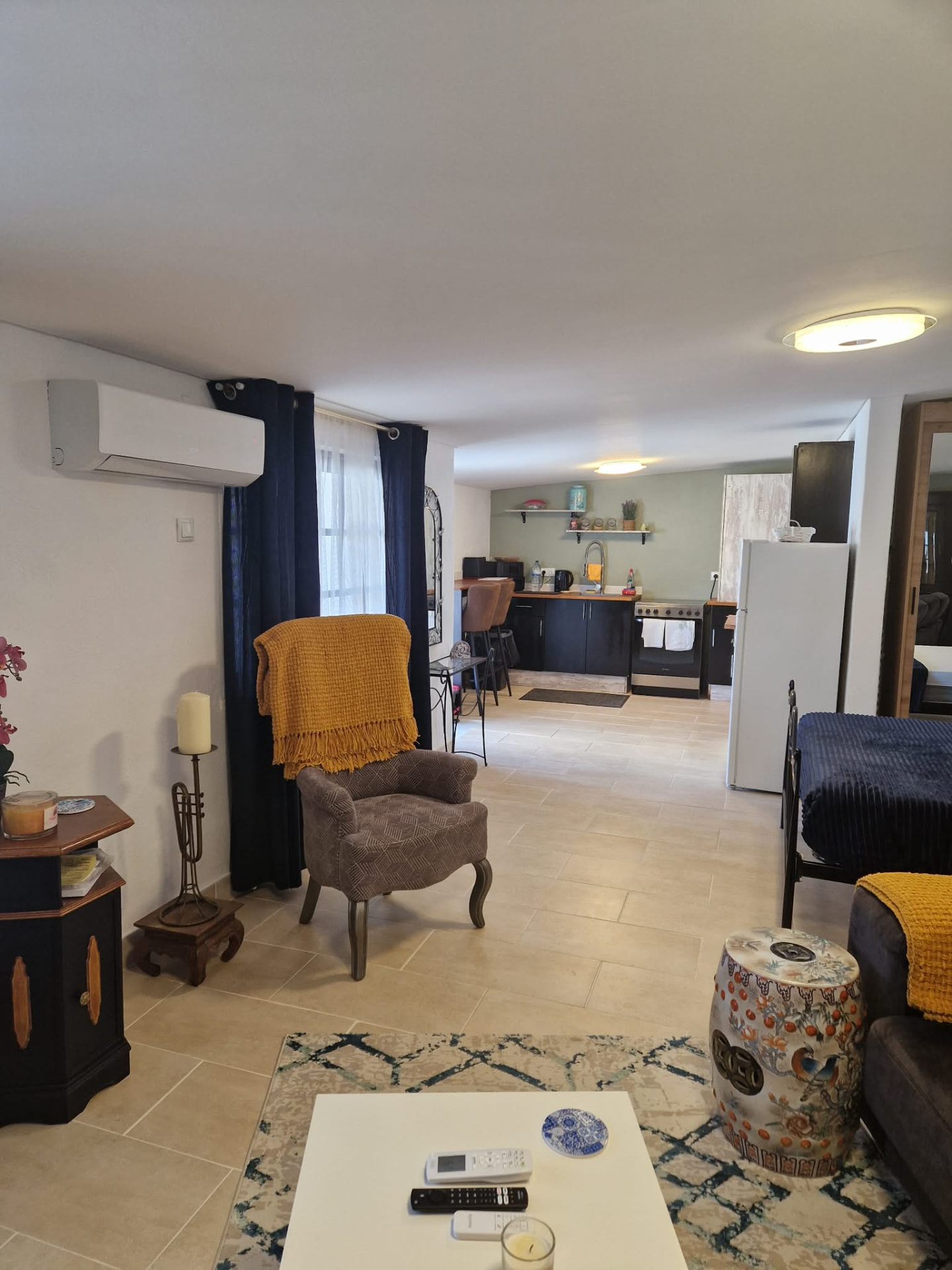 Open-plan living space looking through to the kitchen