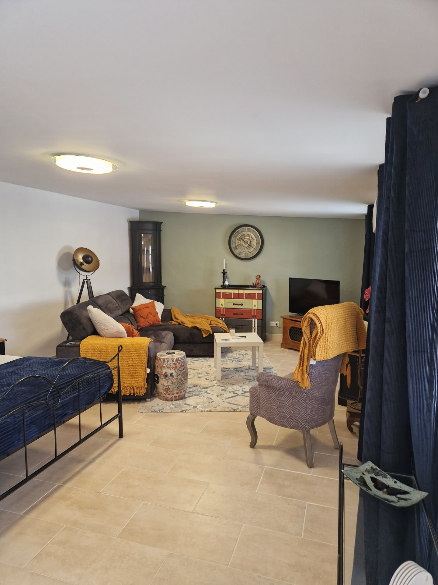 Wide view of the annex living space with air conditioning
